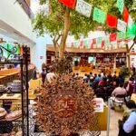 Ceremonia de premiación del VI Concurso Estatal de Alfarería y Cerámica Mexiquense en la Casa de Artesanías del IIFAEM, en Toluca, con público asistente y piezas artesanales en exhibición